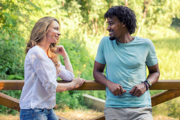 istock Young couple in the summer nature 1166713275