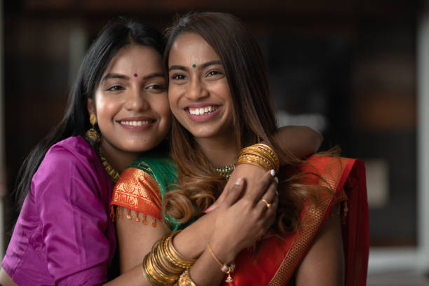 istock Two (2) Happy and Attractive Indian Sisters 1166715098