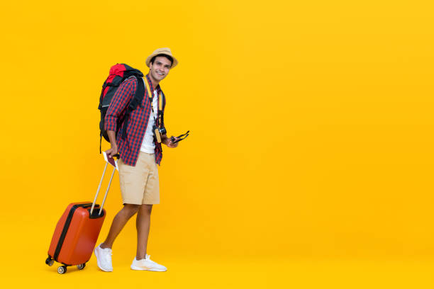 istock Young Asian man ready to travel 1166716467