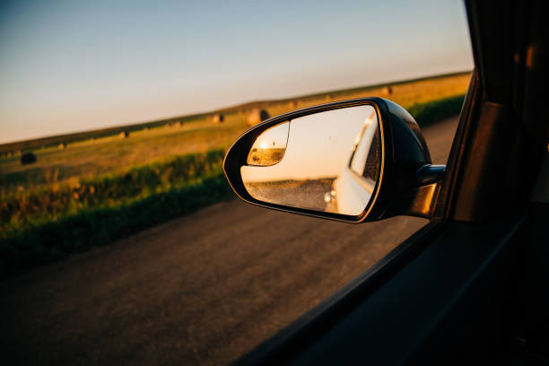 istock a country road at sunset 1166717743