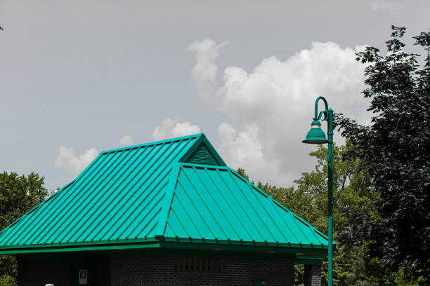 istock Hard roof lines and blue sky soft lines 1166719916