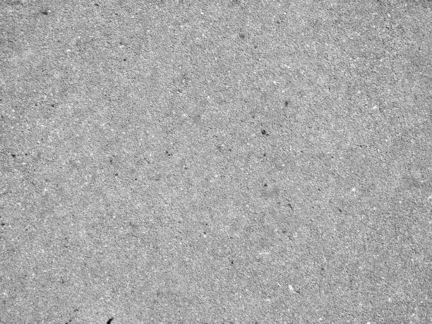 istock Grey grainy textured asphalt closeup photo 1166720032