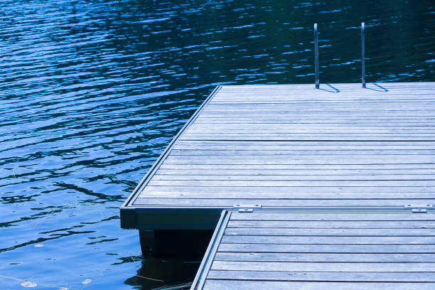 istock Wooden platform next to the lakeside chalet 1166723001