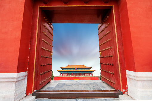 Red gates and historic buildings, Beijing, China. ranslation:\