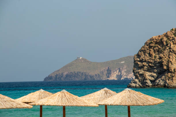 istock Umbrellas on beach in Milos 1166735439