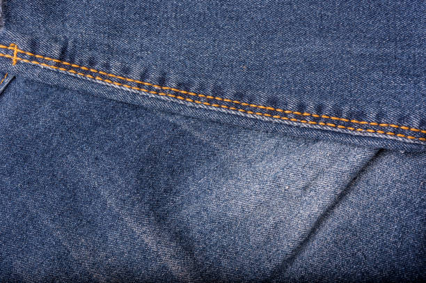 istock Background bleaching jeans, sewing technology, cotton fabric, durability 1166739623