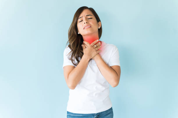 istock Female With Throat Pain In Studio 1166740368
