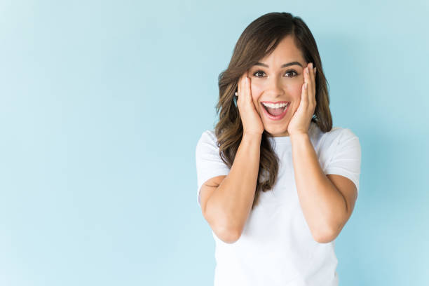 Surprised Beautiful Woman In Studio