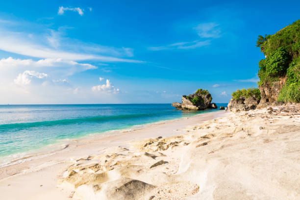 istock Tropical beach with blue ocean, sky and sunshine in Bali 1166741730