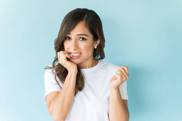 istock Portrait Of Anxious Female In Studio 1166741837