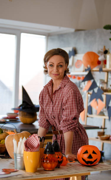 istock Caucasian woman preparing for Halloween 1166743116