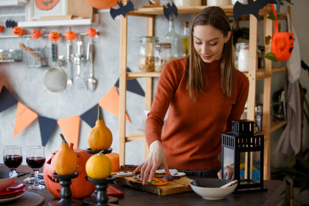 istock Enjoying in Halloween preparations 1166743305