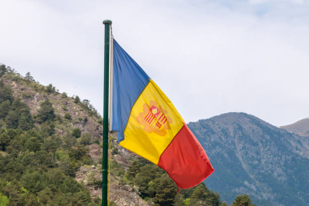 istock National flag of Andorra on a flagpole. 1166747478
