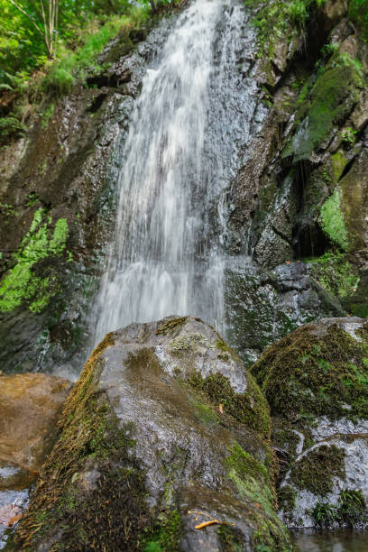 istock Nice waterfall from front with big stones, Novohradske mountain, Czech republic 1166749335