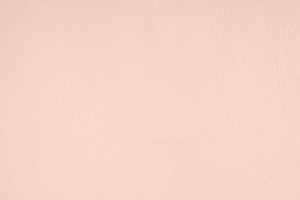 istock Pale pink colored low contrast Concrete textured background 1166753224