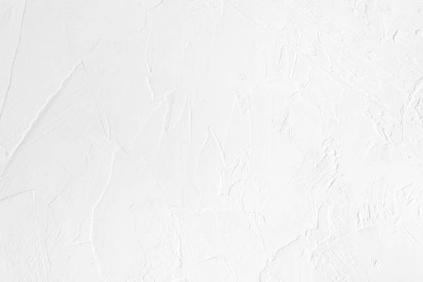istock white colored low contrast Concrete textured background with roughness and irregularities 1166753362