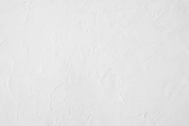 istock white colored low contrast Concrete textured background with roughness and irregularities 1166753366