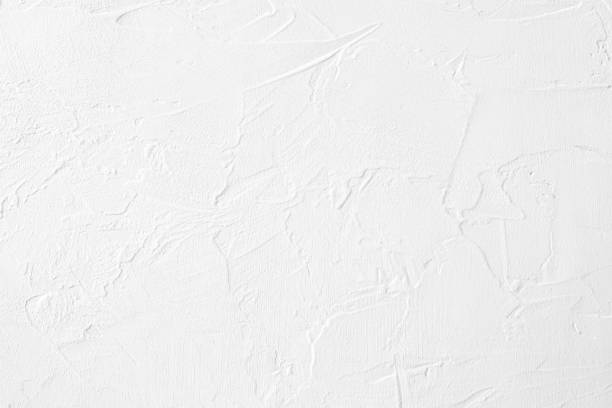 white colored low contrast Concrete textured background with roughness and irregularities