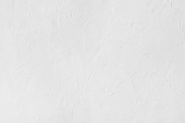 istock white colored low contrast Concrete textured background with roughness and irregularities 1166753383