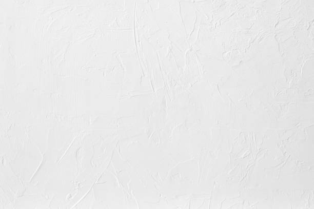 istock white colored low contrast Concrete textured background with roughness and irregularities 1166753394