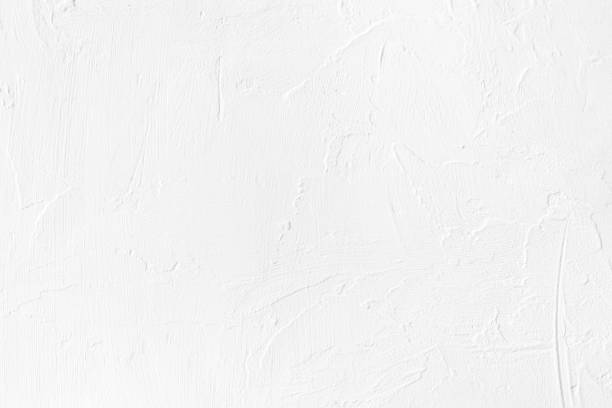 istock white colored low contrast Concrete textured background with roughness and irregularities 1166753403