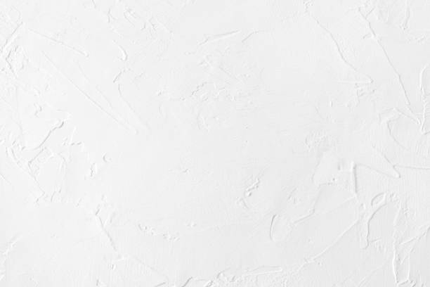 istock white colored low contrast Concrete textured background with roughness and irregularities 1166753406