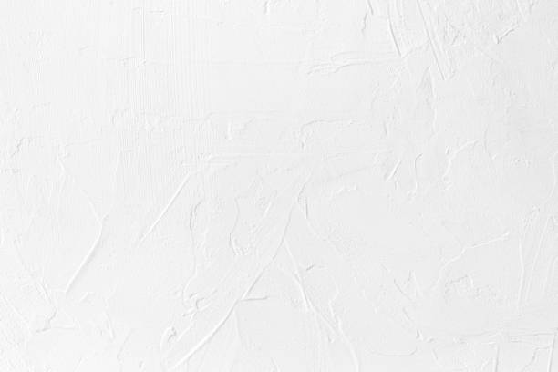 istock white colored low contrast Concrete textured background with roughness and irregularities 1166753408