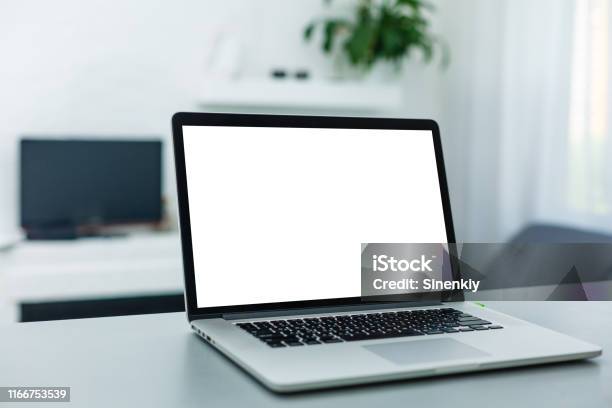 Brand New Notebook With With Display On Table Notebook Computers Stock Photo - Download Image Now