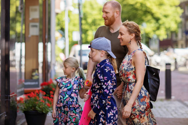 Beautiful dutch farmer family in the city Beautiful dutch farmer family visiting the city gouda south holland stock pictures, royalty-free photos & images