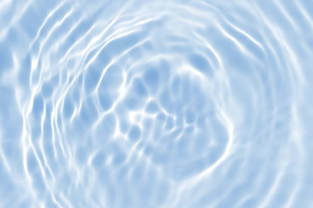 istock blue wave abstract or natural rippled water texture background 1166754405