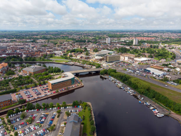 Aerial photo of the River Tee in Middlesbrough a large post-industrial town in the county of North Yorkshire, England, taken on a bright sunny day Aerial photo of the River Tee in Middlesbrough a large post-industrial town in the county of North Yorkshire, England, taken on a bright sunny day cleveland england stock pictures, royalty-free photos & images