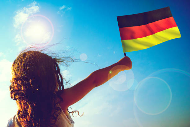istock Little girl waving German flag 1166756054