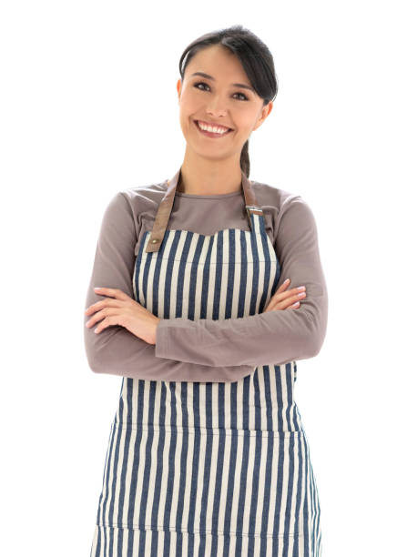 istock Waitress wearing an apron and looking happy 1166756237