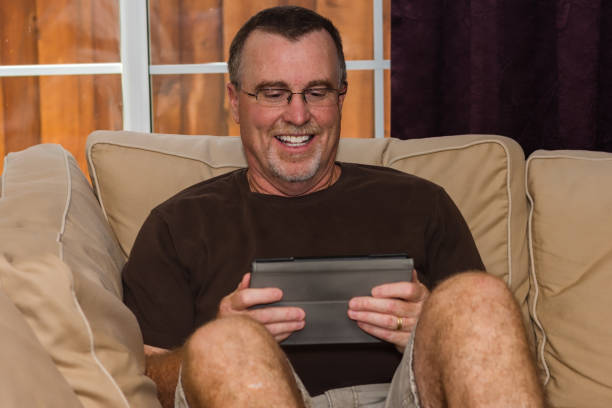 istock watch movie on tablet 1166756400