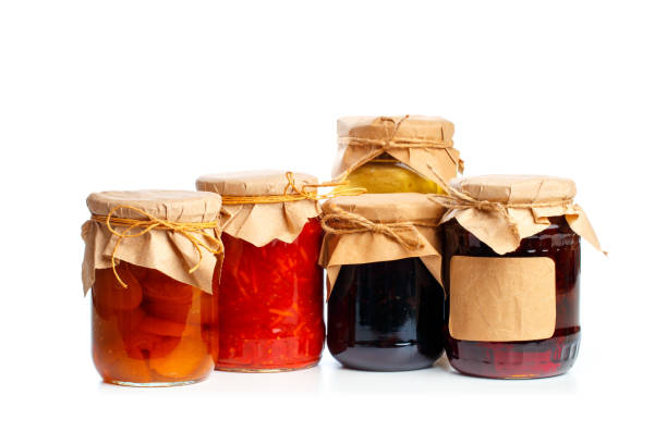 istock set og  glass bottles with preserved food on white background - Image 1166758102
