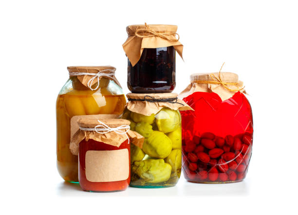 istock set og  glass bottles with preserved food on white background - Image 1166758109