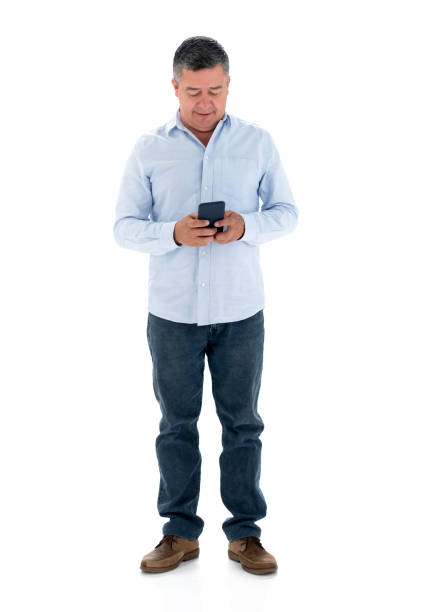 istock Happy man texting on her cell phone 1166759456
