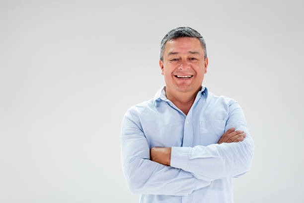 istock Portrait of a happy man in studio 1166759784