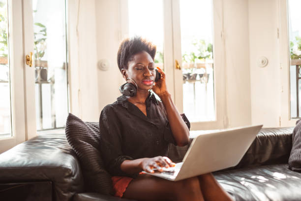istock woman working at home on the phone at home 1166763549