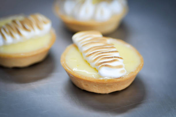 istock lemon tart or vanilla tart with whipped cream 1166765328