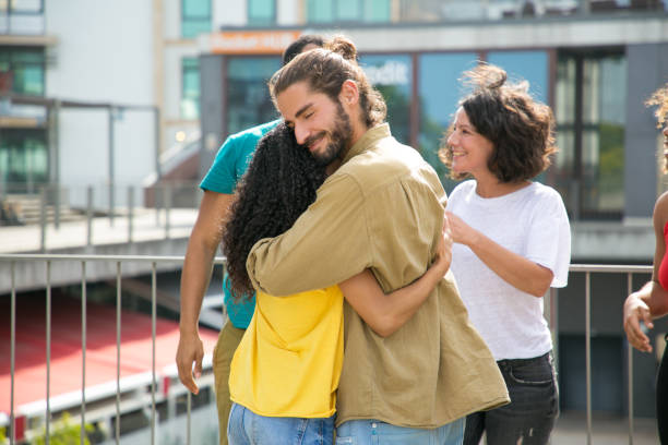 istock Happy Caucasian man cuddling his mix raced girlfriend 1166769525