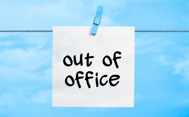Out of office Concept Out of office Written On White Paper Hanging On Blue Background With the Latch after work stock pictures, royalty-free photos & images
