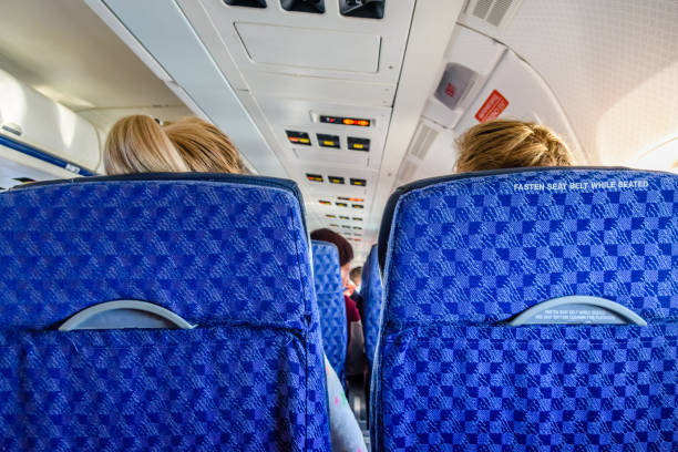 istock Interior of the modern airplane. View from passenger seat 1166770337