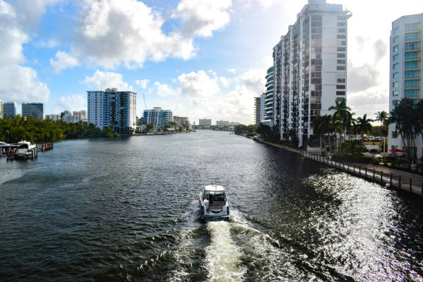 istock Boat Traveling Though Bay in Sunny Isle Beach Florida 1166771871