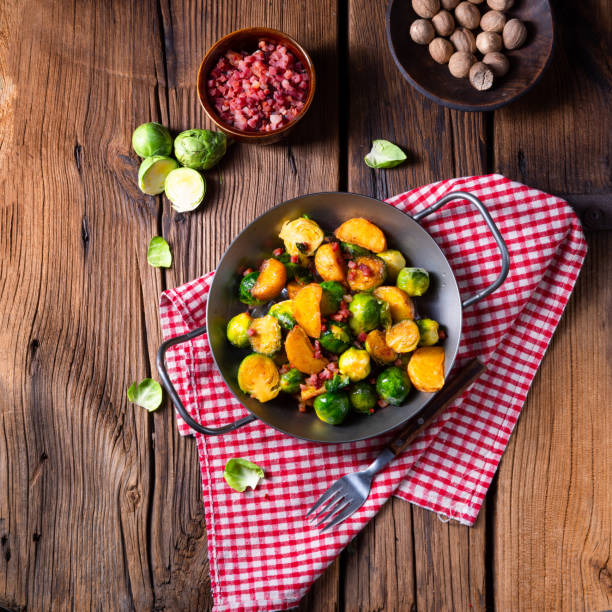 istock Brussels sprouts potato pan with bacon in rustic style 1166772129