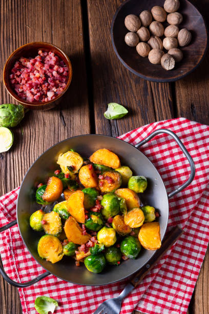 istock Brussels sprouts potato pan with bacon in rustic style 1166772666
