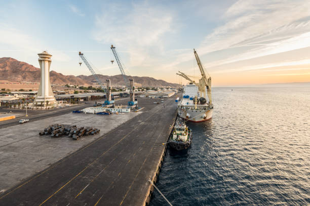 Port of Aqaba, Jordan Aqaba, Jordan - November 6, 2017:  View to the cargo industrial port of Aqaba. The port's location linking Africa and the Middle East. akaba stock pictures, royalty-free photos & images