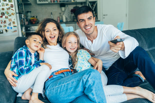 istock Family watching television 1166773789
