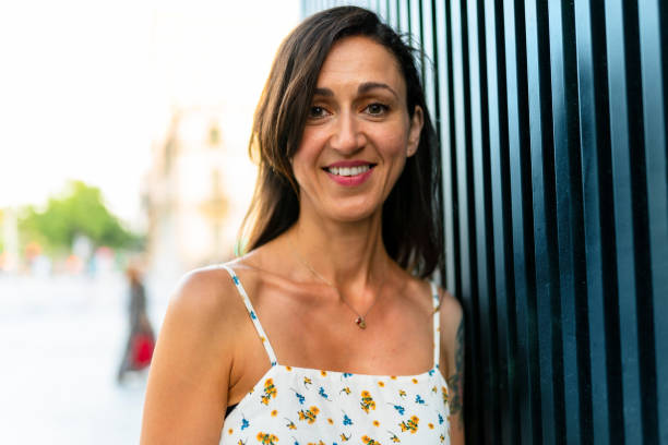 istock Beautiful woman leaning on metallic wall 1166776198