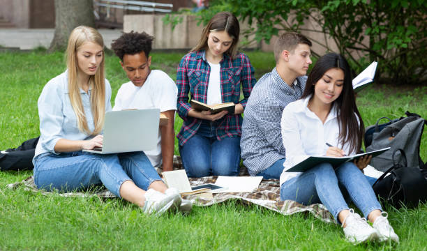 istock Exam preparation. Students studying in college campus 1166776723